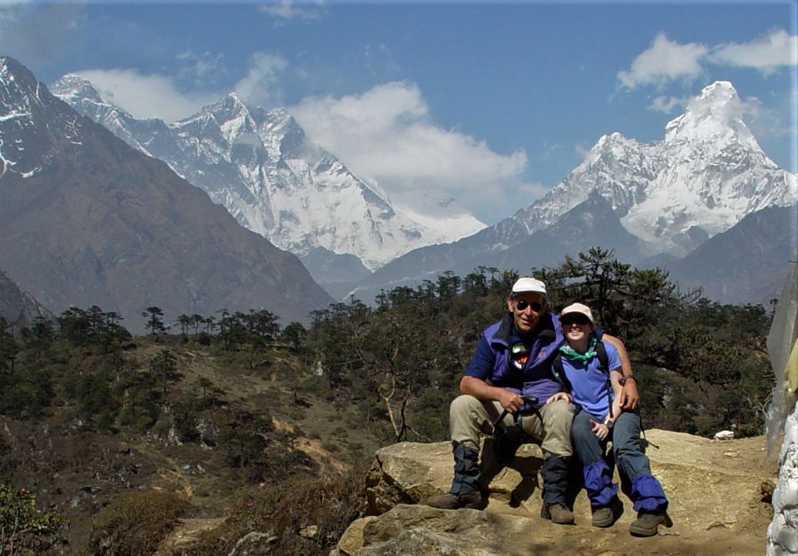 Seth and Empar at Syangboche, with Everest, Lhotse, Nuptse, and Ama Dablam in the background
